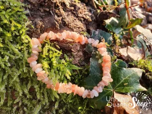 Porte bonheur lotus en bois de rose véritable.